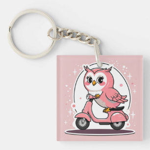 Cute owl driving a scooter keychain