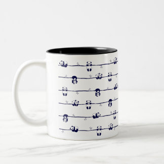 Cute Panda hanging on branches Two-Tone Coffee Mug