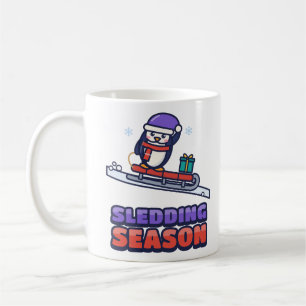 Cute Penguin on a Red Sled Winter Christmas Coffee Mug