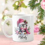 Cute Penguin Pink Christmas Personalized Coffee Mug<br><div class="desc">Create a unique personalized Christmas mug that features a cute penguin in a pink Santa hat and scarf, surrounded by festive greenery and ornaments. The girly pink design of the cheerful penguin with a snowman, and name template in a calligraphy script font makes it easy to create a perfect coffee...</div>