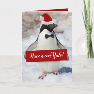 Cute Penguin Santa Hat Holding Yuletide Sign Holiday Card