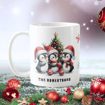 Cute Penguins in Red Santa Hats Family Christmas Coffee Mug<br><div class="desc">Create a unique personalized Christmas coffee mug that features a cute illustration of three penguins in red Santa hats having fun near a Christmas tree. It is perfect for winter Holidays and as a Christmas gift for family and friends.</div>