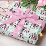 Cute Penguins Pattern Mint and Pink Christmas Wrapping Paper<br><div class="desc">This joyful mint green and pink Christmas wrapping paper features a unique pattern of penguins in pink apparel having fun while celebrating the winter holidays. Cute penguins decorate Christmas trees, meet family and friends, and go ice skating, so this design is perfect for stylish festive gift wraps.</div>