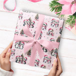 Cute Penguins Pattern Pink Christmas Wrapping Paper<br><div class="desc">This joyful pink Christmas wrapping paper features a unique pattern of penguins in pink apparel having fun while celebrating the winter holidays. Cute penguins decorate Christmas trees,  meet family and friends,  and go ice skating,  so this design is perfect for girly festive gift wraps.</div>