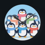 Cute Penguins Winter Scarves Group Hug Round Clock<br><div class="desc">Adorable gang of cheerful cartoon penguins wrapped in colorful cozy scarves,  huddling together on a snowy blue background. Sweet,  heartwarming and playful,  this charming winter scene radiates joy and friendship.</div>