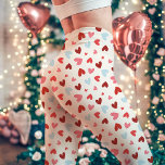 Cute Pink and Blue Valentine's Day Heart Pattern Leggings<br><div class="desc">Celebrate love with these charming Valentine's Day Heart Pattern Leggings! Featuring an adorable mix of red, pink, and blue hearts scattered across a cream background, these leggings are perfect for spreading love and joy. Whether you're relaxing at home, heading to a yoga class, or celebrating Valentine’s Day with someone special,...</div>