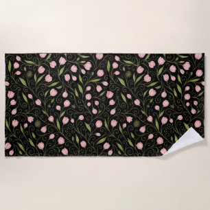 Cute, pink flower on black with repeating pattern  beach towel