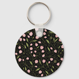 Cute, pink flower on black with repeating pattern keychain