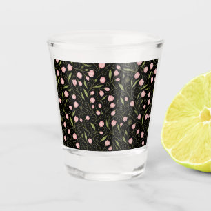 Cute, pink flower on black with repeating pattern shot glass
