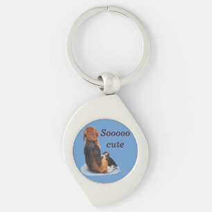 Cute puppy dog beagle cuddling his mum keychain
