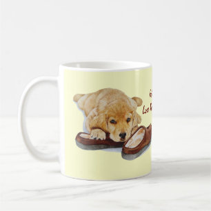 cute puppy golden retriever dog cuddling slippers coffee mug