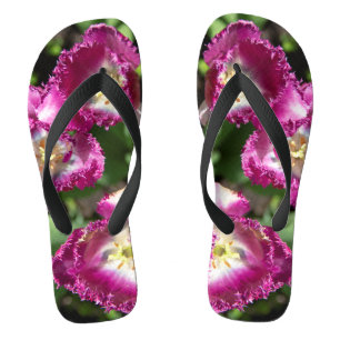 Cute purple  tulips  in the garden  flip flops