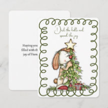 Cute Rabbit Decorating the Christmas Tree