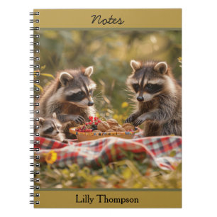 Cute raccoon family having a picnic notebook