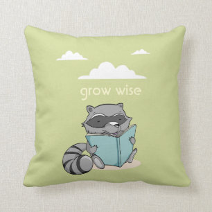 Cute raccoon reading to book. Green children Throw Pillow