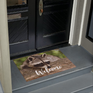 Cute Raccoon Resting on a Log Welcome Doormat