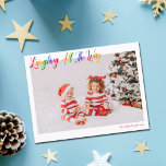 Cute Rainbow Laughing All The Way Christmas Photo Holiday Postcard<br><div class="desc">Beautiful,  colourful horizontal photo Christmas postcard with Laughing All the Way in pretty rainbow cursive script. Personalize with your favourite family photograph of your smiling kids above your name or custom greeting in red. Fun and cheerful holiday postcards.</div>