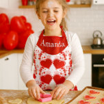Cute Red Heart Personalized Valentine's Day  Apron<br><div class="desc">This red and white apron features a cute red heart design. Personalize the apron with a name or other text to make it extra special. Perfect for both children and adults, this apron is a thoughtful gift for young girls who love to bake Valentine's Day cookies or anyone who enjoys...</div>
