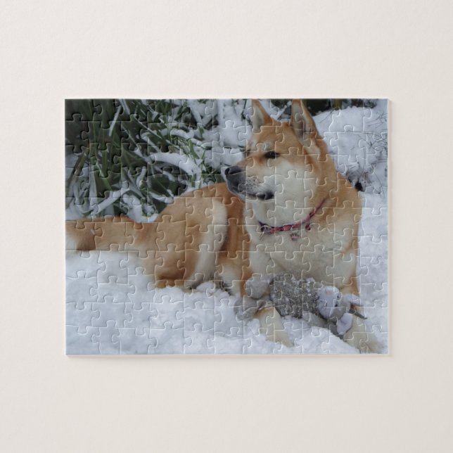 Cute red japanese akita in snow with grey mouse jigsaw puzzle (Horizontal)