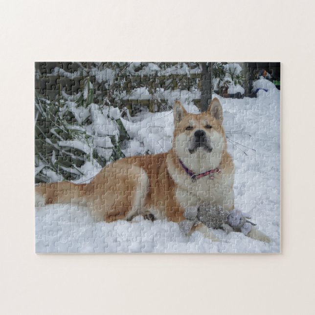 Cute red japanese akita in snow with grey mouse jigsaw puzzle (Horizontal)