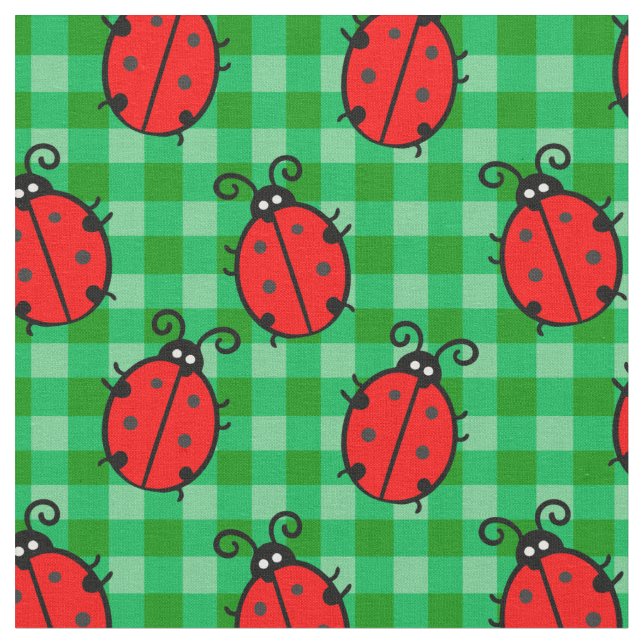 Cute red ladybug on green plaid cage fabric (Close Up)