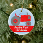 Cute Red Tractor Baby's First Christmas Watercolor Ceramic Ornament<br><div class="desc">This design features our cute red watercolor tractor on a blue watercolor background. Click the customize button for more flexibility in modifying the text! Variations of this design, additional colours, as well as coordinating products are available in our shop, zazzle.com/store/doodlelulu. Contact us if you need this design applied to a...</div>