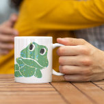 Cute Retro Frog Graphic Personalized Coffee Mug<br><div class="desc">Create an un-froggettable gift when you add a name to this coffee mug. It features a cute retro style frog illustration. The green cartoon frog has blue and yellow speckles. Your name or other text appears in bright blue lettering. The frog graphic appears on both sides of the mug.</div>