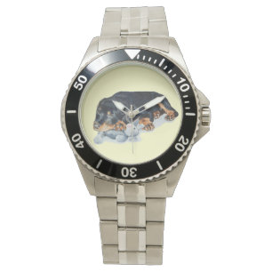 cute rottweiler puppy dog cuddling teddy bear art watch