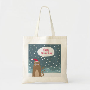 Cute santa claus kitten in xmas snowy landscape tote bag