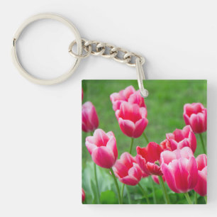 Cute scarlet tulips in the garden keychain