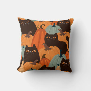 Cute seamless pattern with black cats and pumpkins throw pillow