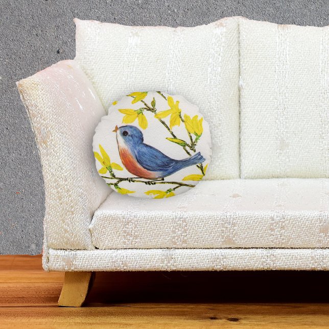 Cute Singing Blue Bird Tree Branch Round Pillow (Little singing blue red bird on branch yellow flowers textured look white decorative pillow.)