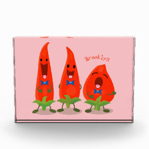 Cute singing chilli peppers cartoon illustration photo block