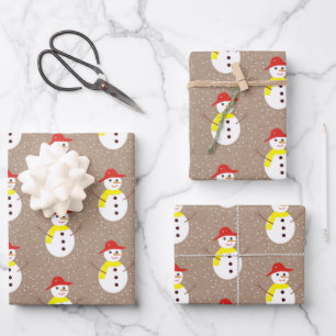 Cute snowman and snow on brown kraft  wrapping paper sheet