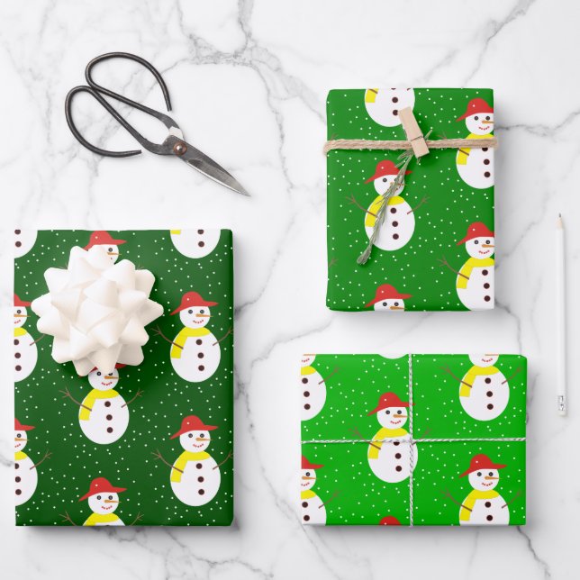 Cute snowman and snow on green wrapping paper sheet (Front)