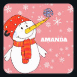 Cute Snowman and Snowflakes Kids Christmas Square Sticker<br><div class="desc">Cute Snowman and Snowflakes Kids Christmas Square Sticker. Snowman Christmas holiday gift sticker for children. Christmas gift stickers - personalize the stickers with child`s name. The sticker has a cute snowman with a snowflake on his nose. The background is pink with beautiful white snowflakes in different sizes and shapes. Make...</div>