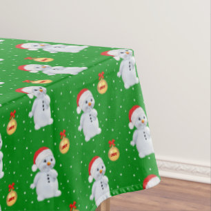 Cute Snowman and Snowflakes on Green Tablecloth