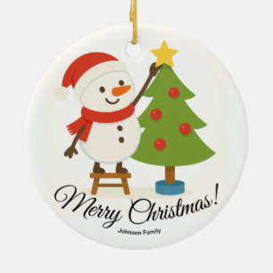 Cute Snowman Decorating Tree Personalized Name Ceramic Ornament