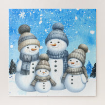 Cute snowman family in the snow
