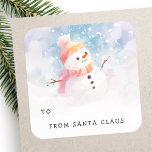 Cute snowman illustration to from gift tag sticker<br><div class="desc">To from gift tag stickers featuring an illustration of a cute snowman wearing a hatcute storybook style snowman,  and the text "to" and space for you to hand write a name,  and below the text "from Santa Claus".</div>