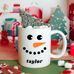 Cute Snowman Kids Christmas Coffee Mug<br><div class="desc">This custom snowman mug makes the perfect personalized Christmas gift. It features a cute snowman face with your name. This hot chocolate or coffee mug is perfect for your children,  grandkids or friends. Give as a secret Santa or office gift.</div>