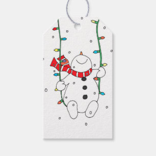 Cute snowman swinging on christmas lights gift tags