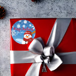 Cute Snowman Winter Wonderland Merry Christmas Classic Round Sticker<br><div class="desc">Personalized Christmas sticker featuring a cute illustration of a snowman on a blue gradient background with snowflakes. The text is fully customizable. To change it use the Personalize option. For more changes,  such as changes to the font,  font colour or text layout,  use the Edit design tool option.</div>
