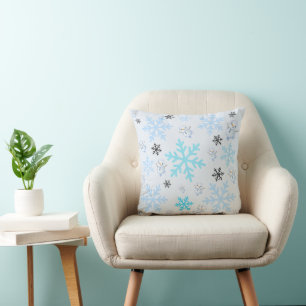 Cute snowmen and snowflakes in light blue throw pillow