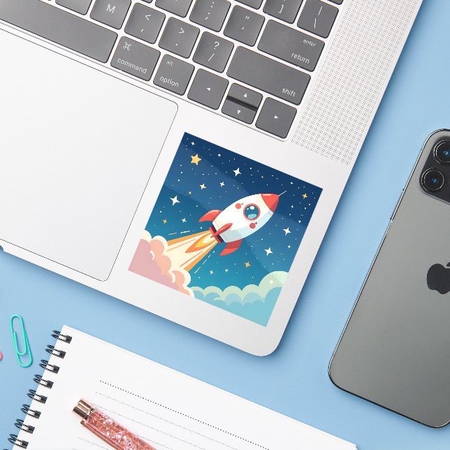 Cute space rocket blasting off (Laptop w/ iPhone)