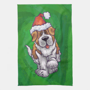 Cute St. Bernard in Santa Hat on Green Kitchen Towel