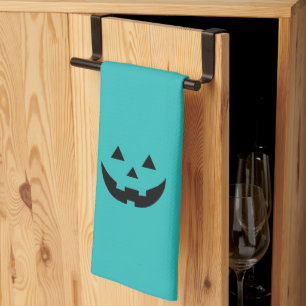 Cute teal jack o lantern pumpkin face Halloween Kitchen Towel