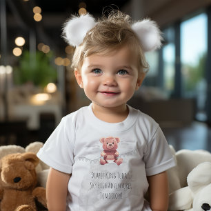 cute teddy bear on pile of diapers 1st Birthday Baby T-Shirt
