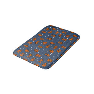 Cute teddy bear on polka dot bath mat