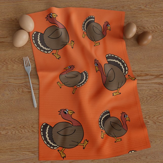 Cute Thanksgiving Turkeys Orange Serviette de cuis (A fun thanksgiving turkey trotting along on this orange kitchen towel with his pals)